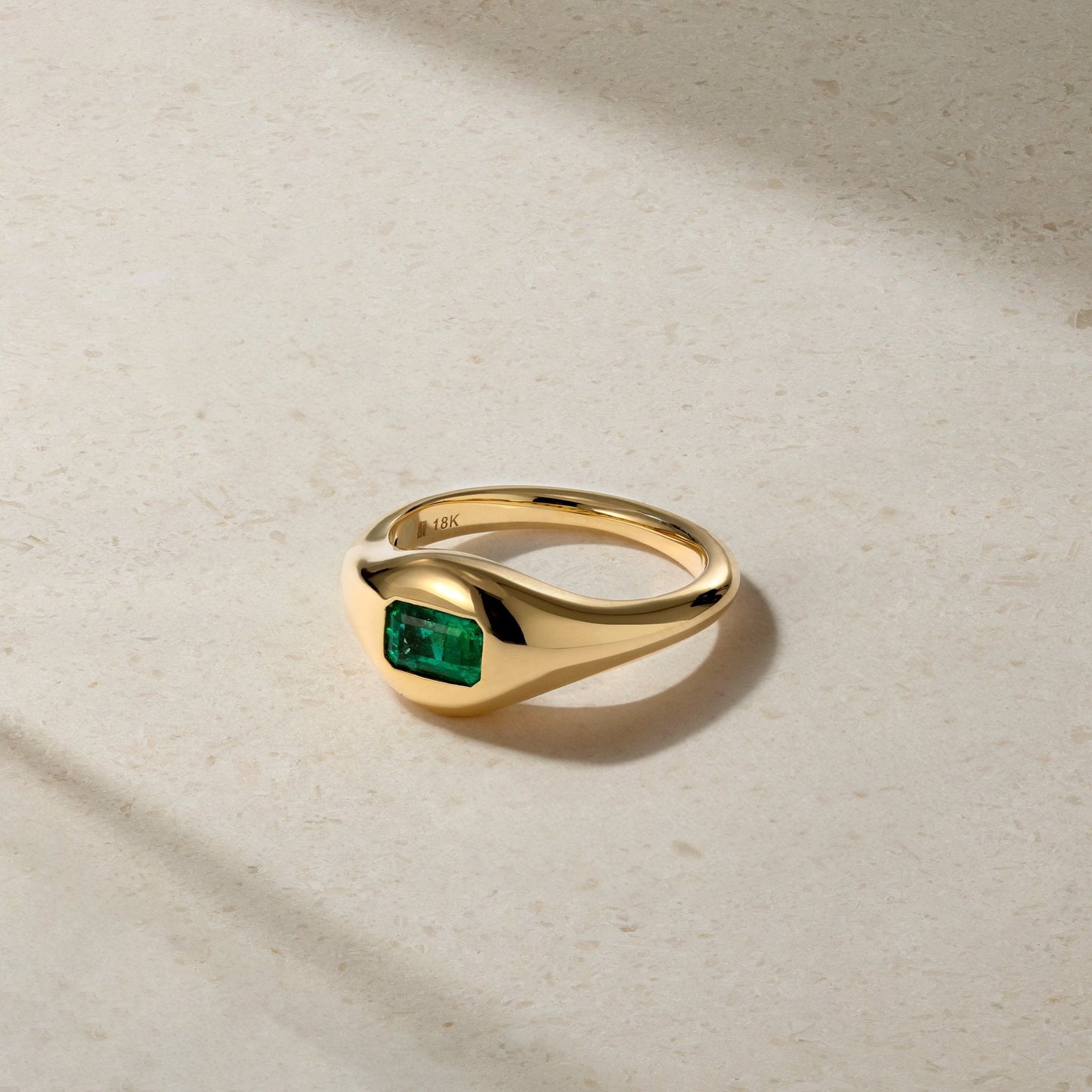 Mark Henry Chunky Slim Emerald (.55ct) Signet Ring in 18ct yellow gold, size 6.5 available at Schwanke-Kasten Jewelers in Milwaukee, WI.