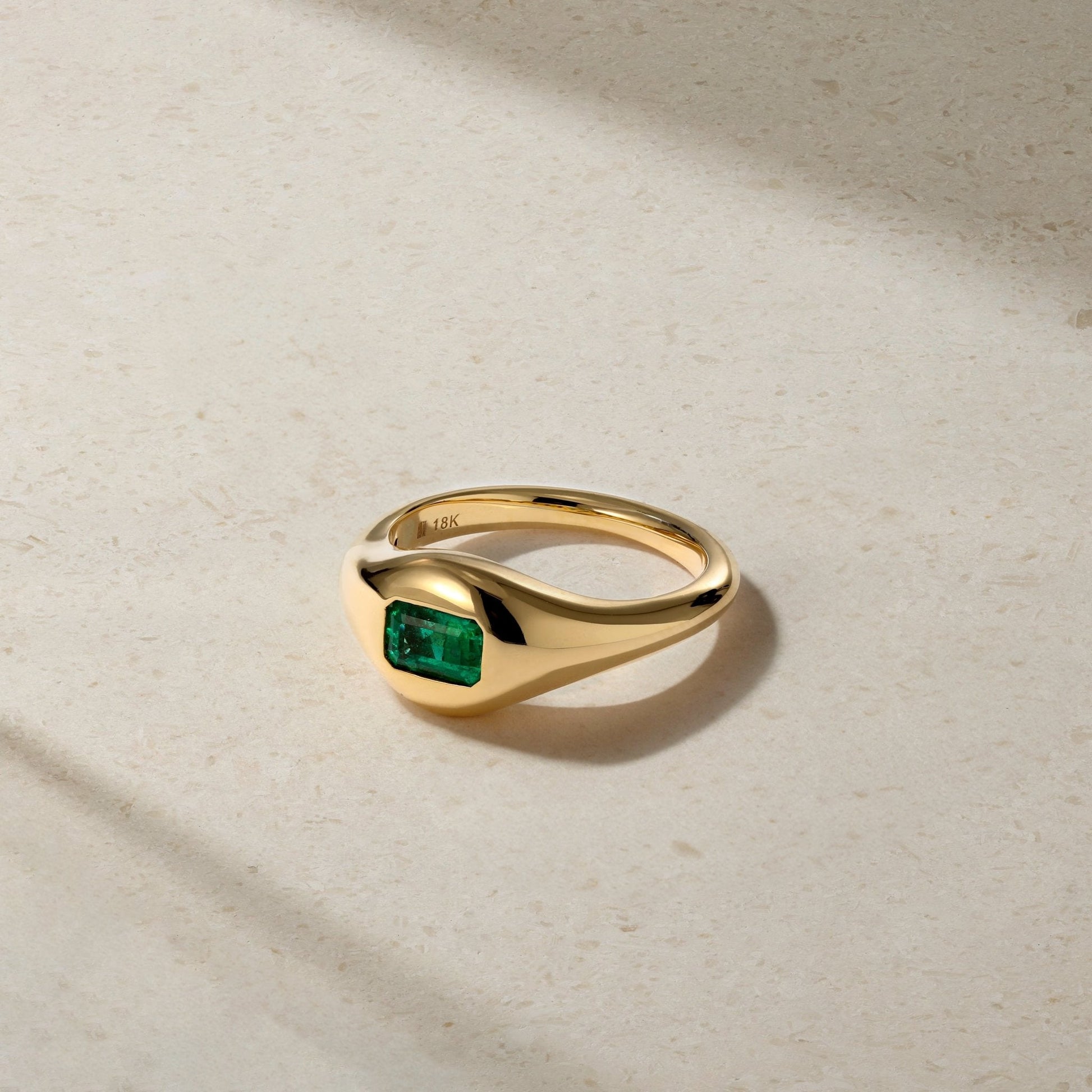 Mark Henry Chunky Slim Emerald (.55ct) Signet Ring in 18ct yellow gold, size 6.5 available at Schwanke-Kasten Jewelers in Milwaukee, WI.