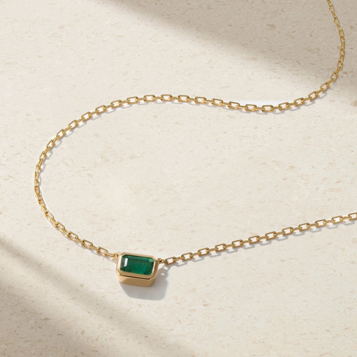 Mark Henry Classic Bezel-Set Solitatire Emerald (.5ct) 16"-18" 18ct yellow gold pendant necklace available at Schwanke-Kasten Jewelers (NM1231-E)