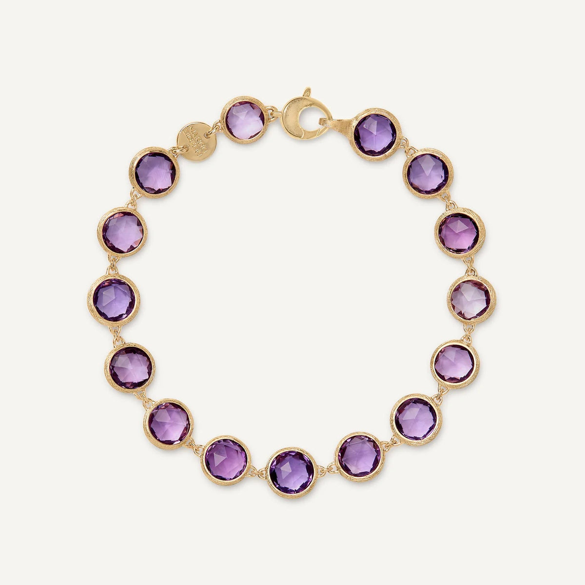 A gold bracelet featuring ten round-cut purple amethyst gemstones in bezel settings, arranged in a circular shape on a light cream background.