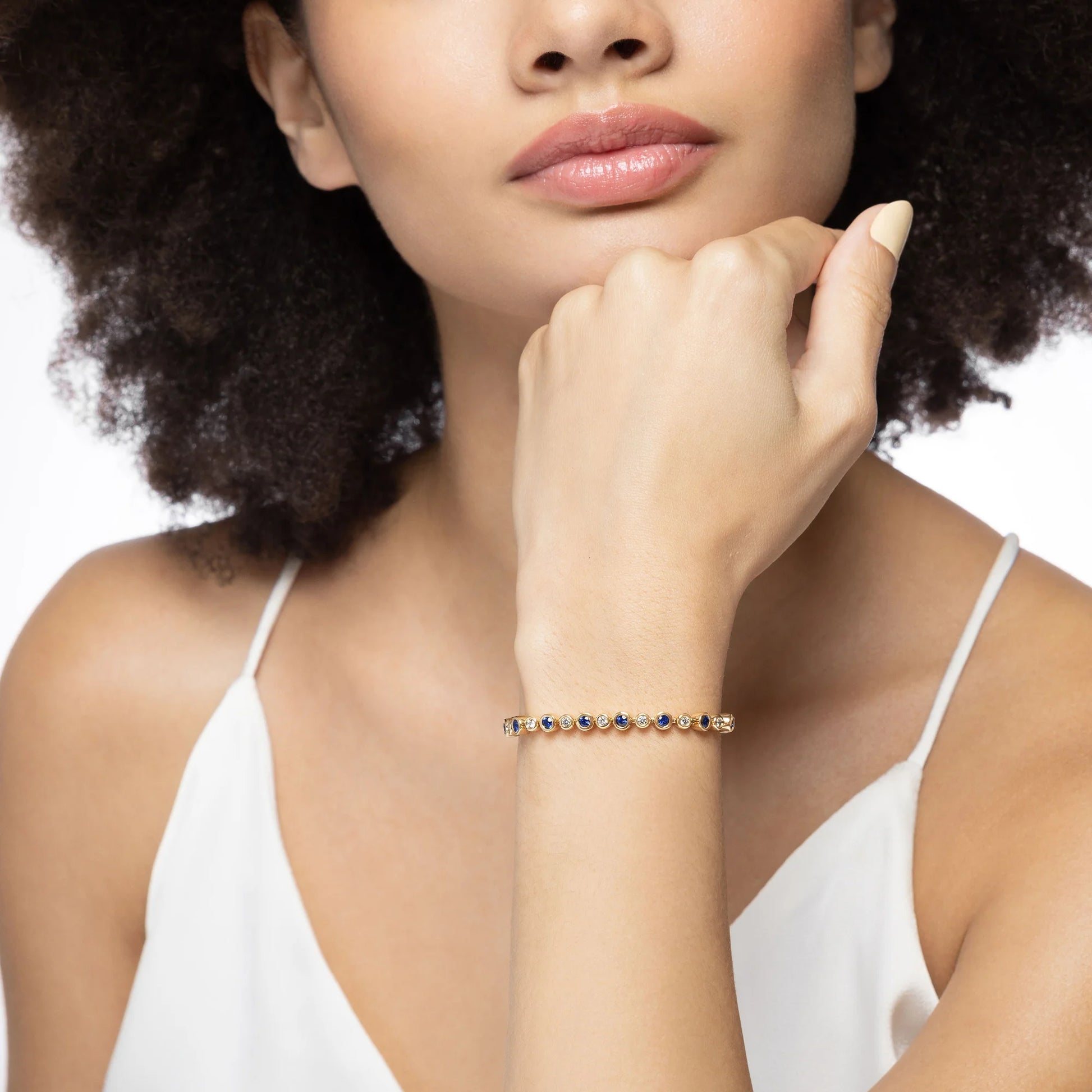 Diamond & Sapphire Alternating Bezel Set in 18ct gold bracelet on a model