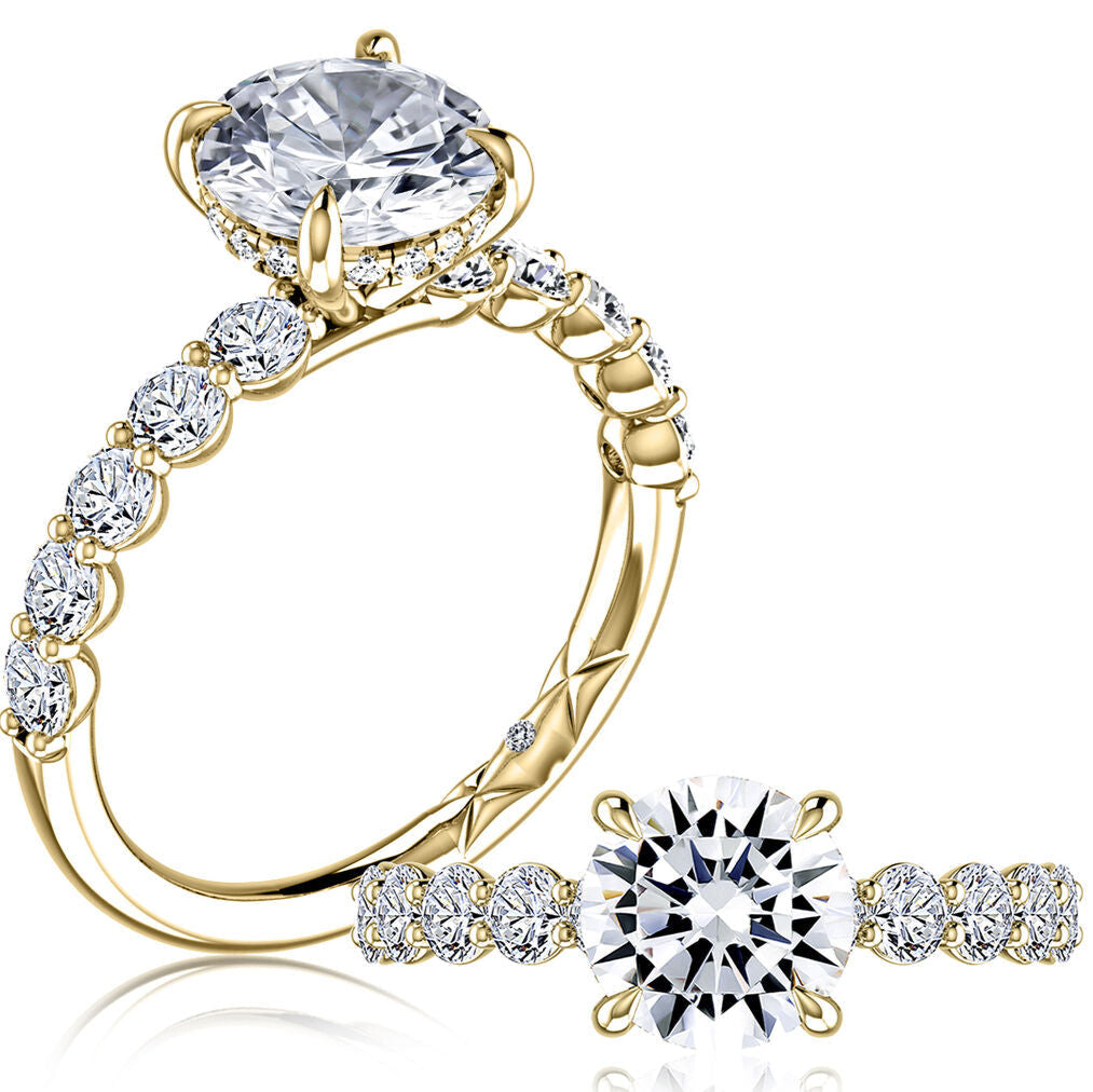 Gold ring with diamond accents on a white background