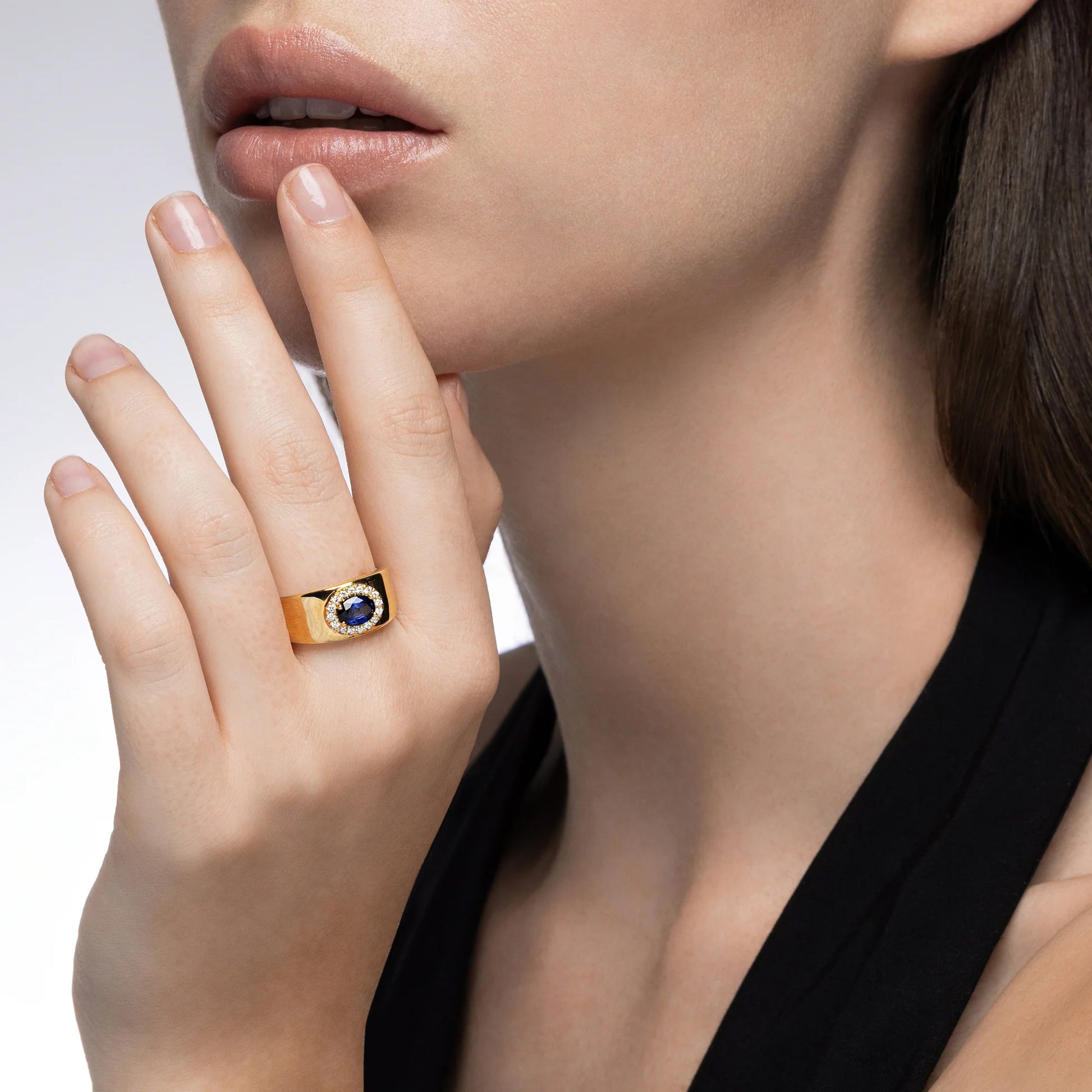 On Model - Mark Henry Heirloomed Oval-Cut Sapphire (1.02ct) Cigar Band (18ct yellow gold, size 6.5) with .12ctw diamond halo at Schwanke-Kasten Jewelers (RM5574)