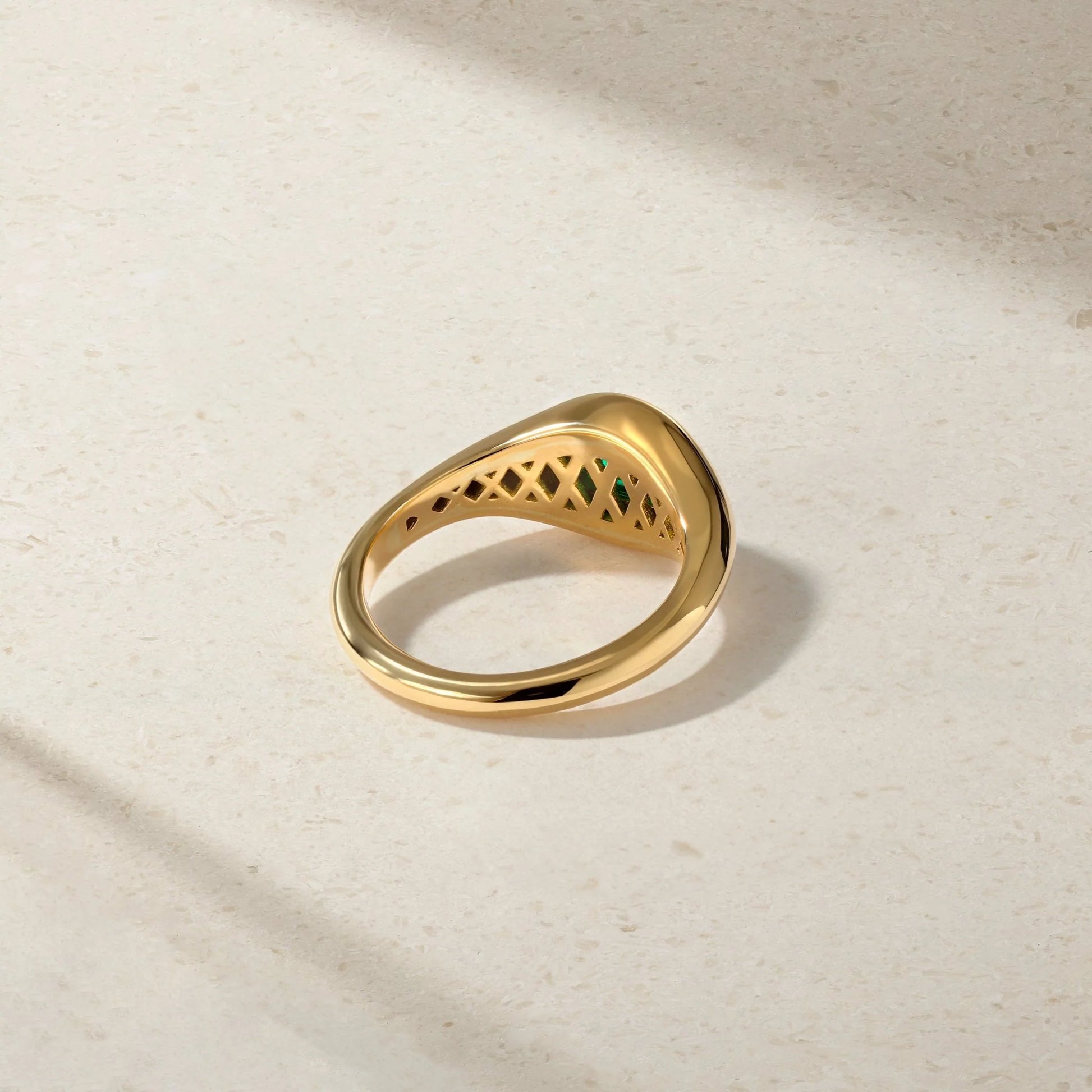 Underside of Mark Henry Chunky Slim Emerald (.55ct) Signet Ring in 18ct yellow gold, size 6.5 available at Schwanke-Kasten Jewelers in Milwaukee, WI.