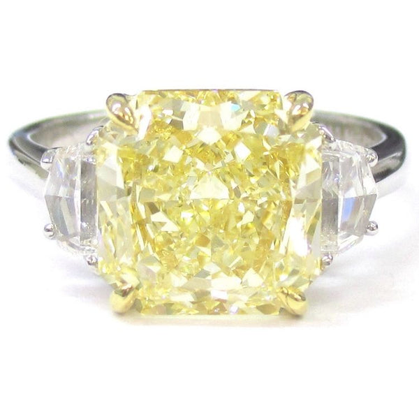 three stone yellow diamond ring