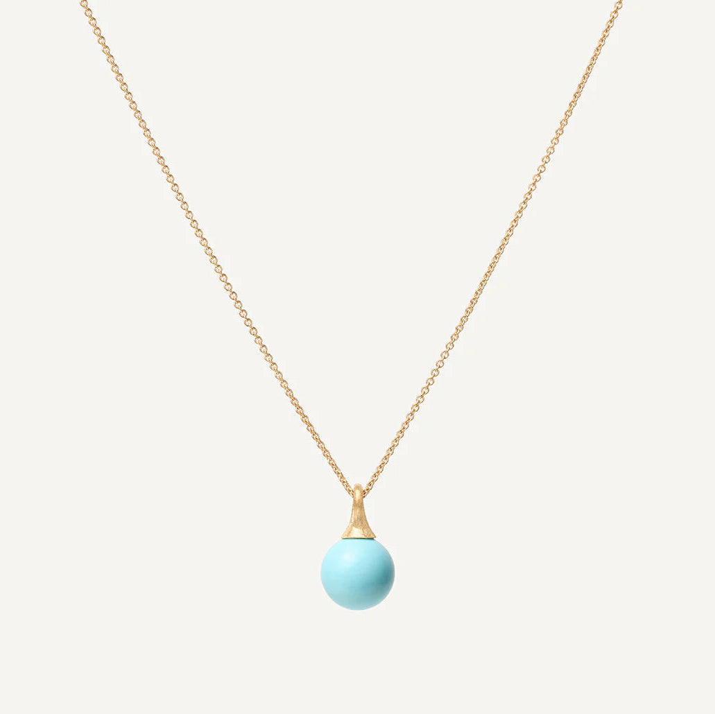 Necklace with a turquoise pendant on a white background
