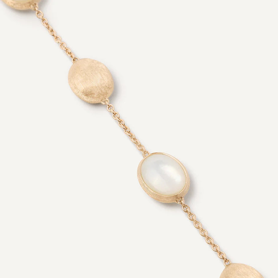 Alternating Gold and Mother Pearl Stations on Bracelet, details