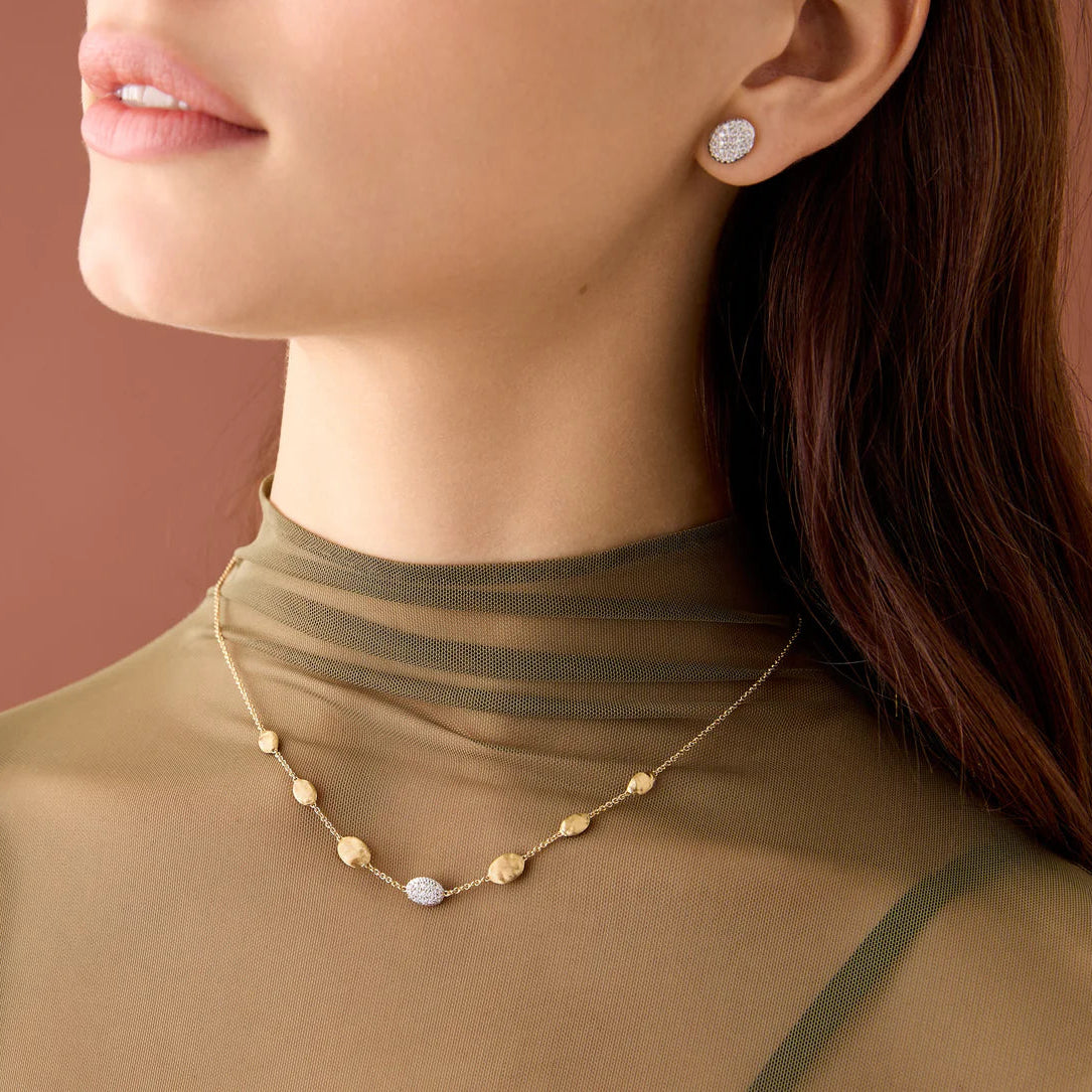 Marco Bicego 7-station siviglia gold necklace on model